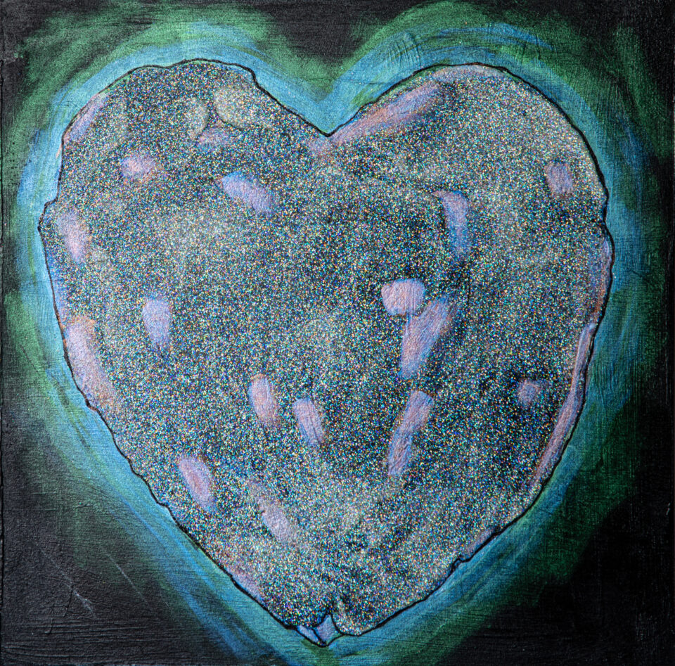 An iridescent, glowing blue heart on a black background.
