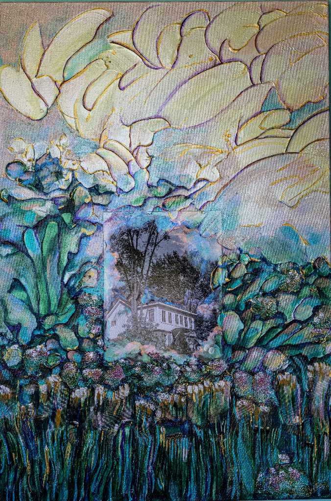 A black and white photo of a two-storey house sits under pink and gold clouds and is surrounded by green and blue folliage and crops.